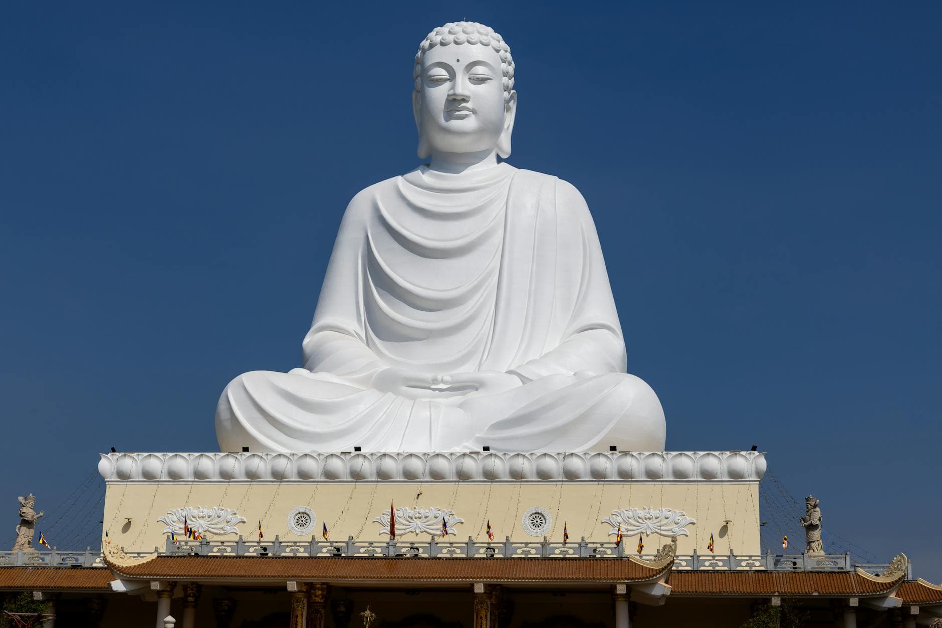Seated Buddha image in a Vietnamese Mahayana pagoda — the focal object of Phật Đản observances on the weekend of Sunday 31 May 2026 (Phật lịch 2570).