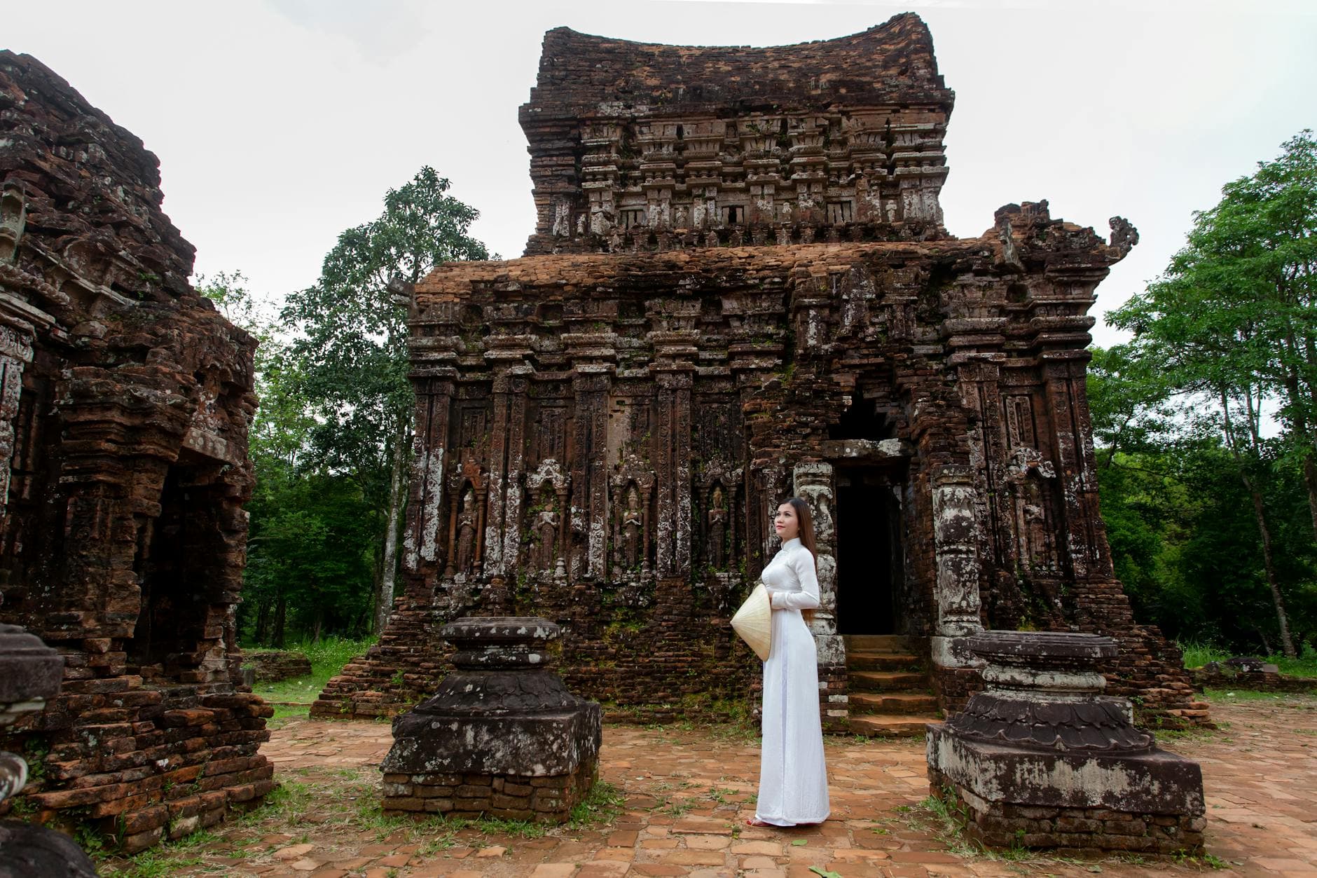 Brick towers of the Mỹ Sơn sanctuary (Thánh địa Mỹ Sơn), the 4th–13th-century Champa Hindu complex in Quảng Nam, downriver from the Sa Huỳnh-culture cemetery at Lai Nghi.