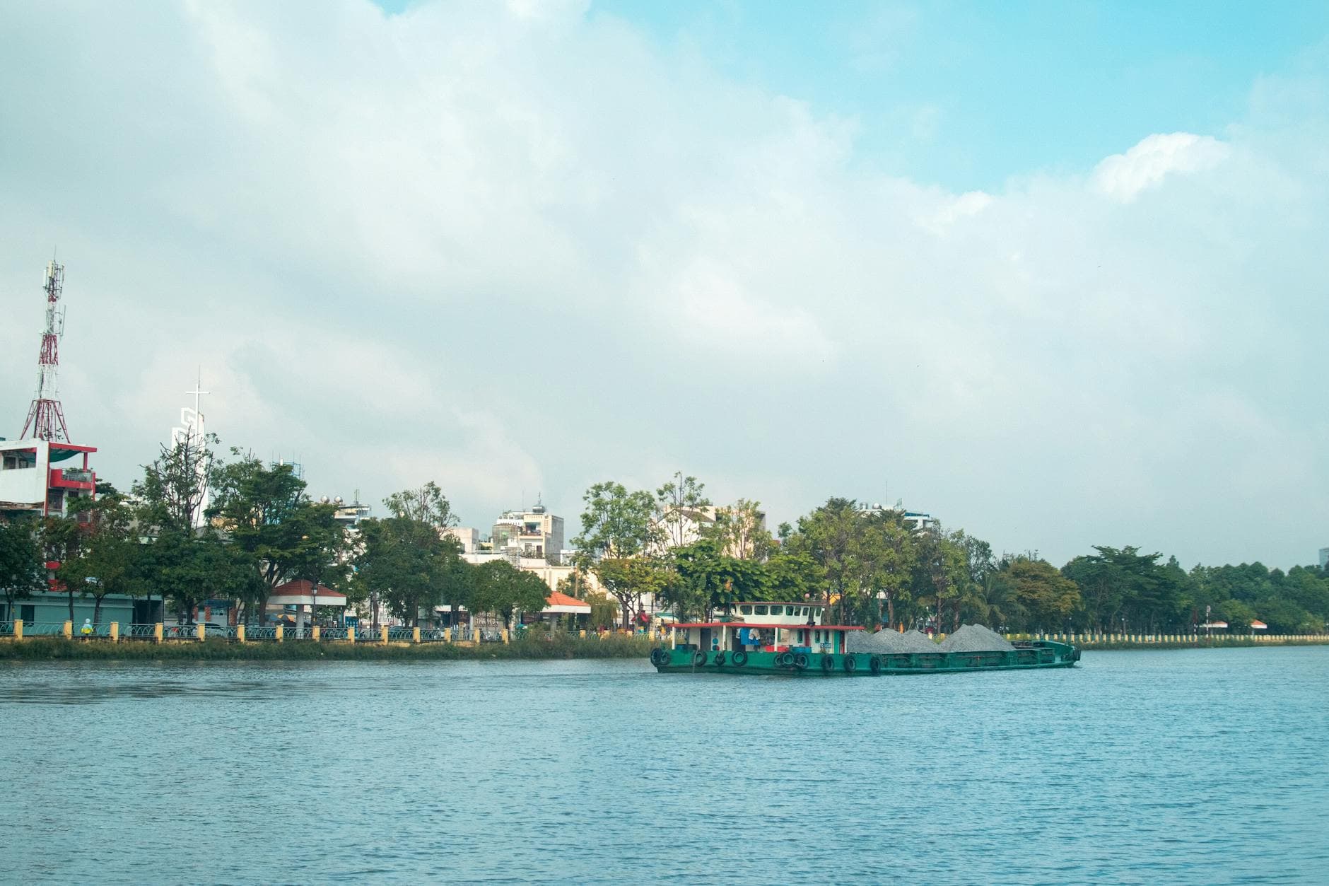 Quiet morning light on the Thu Bồn river in Hội An — the setting for Nghê Prana's daily riverside movement practice.