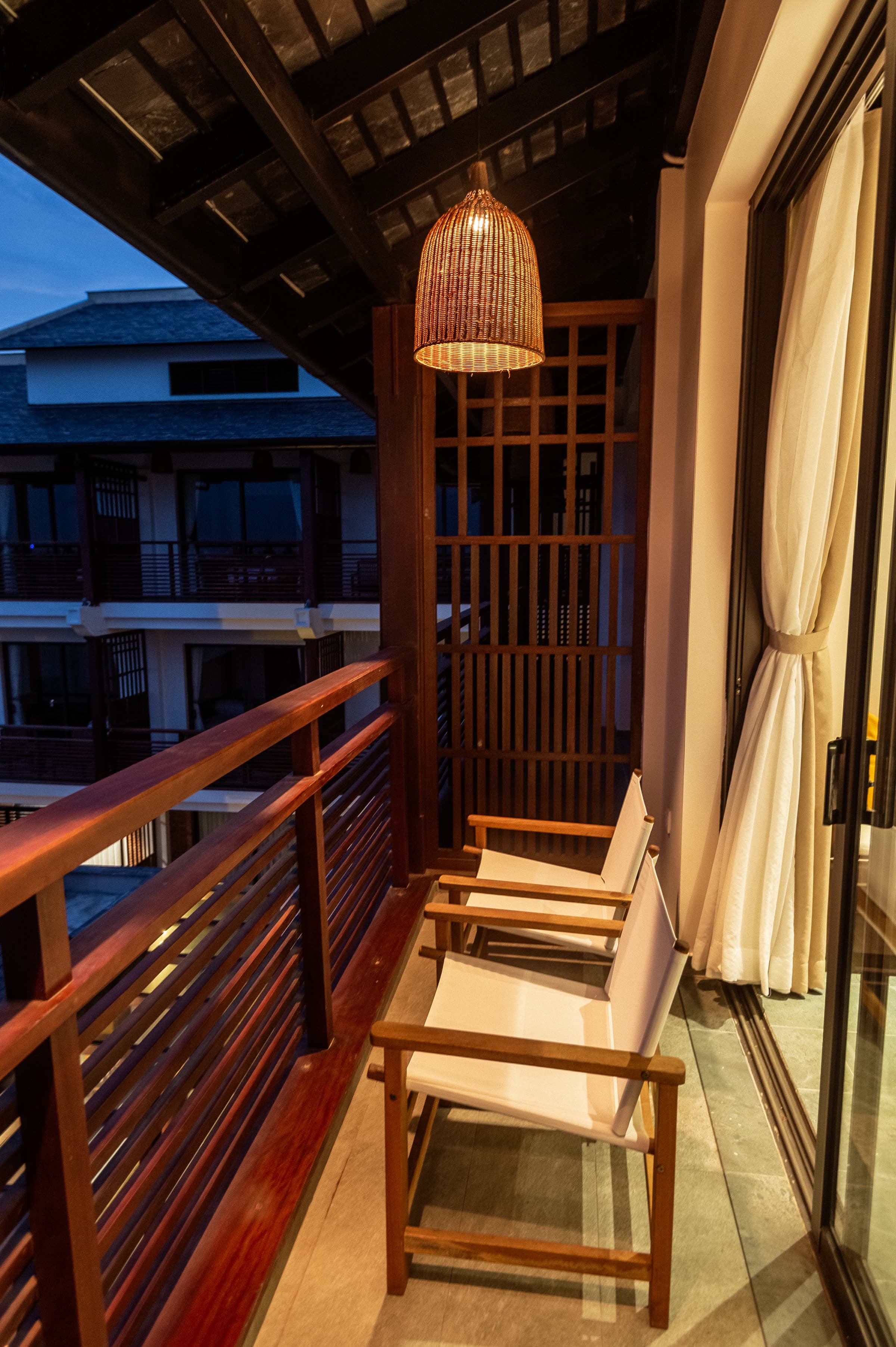 Evening light on the Family Duplex balcony, looking along the riverside wing