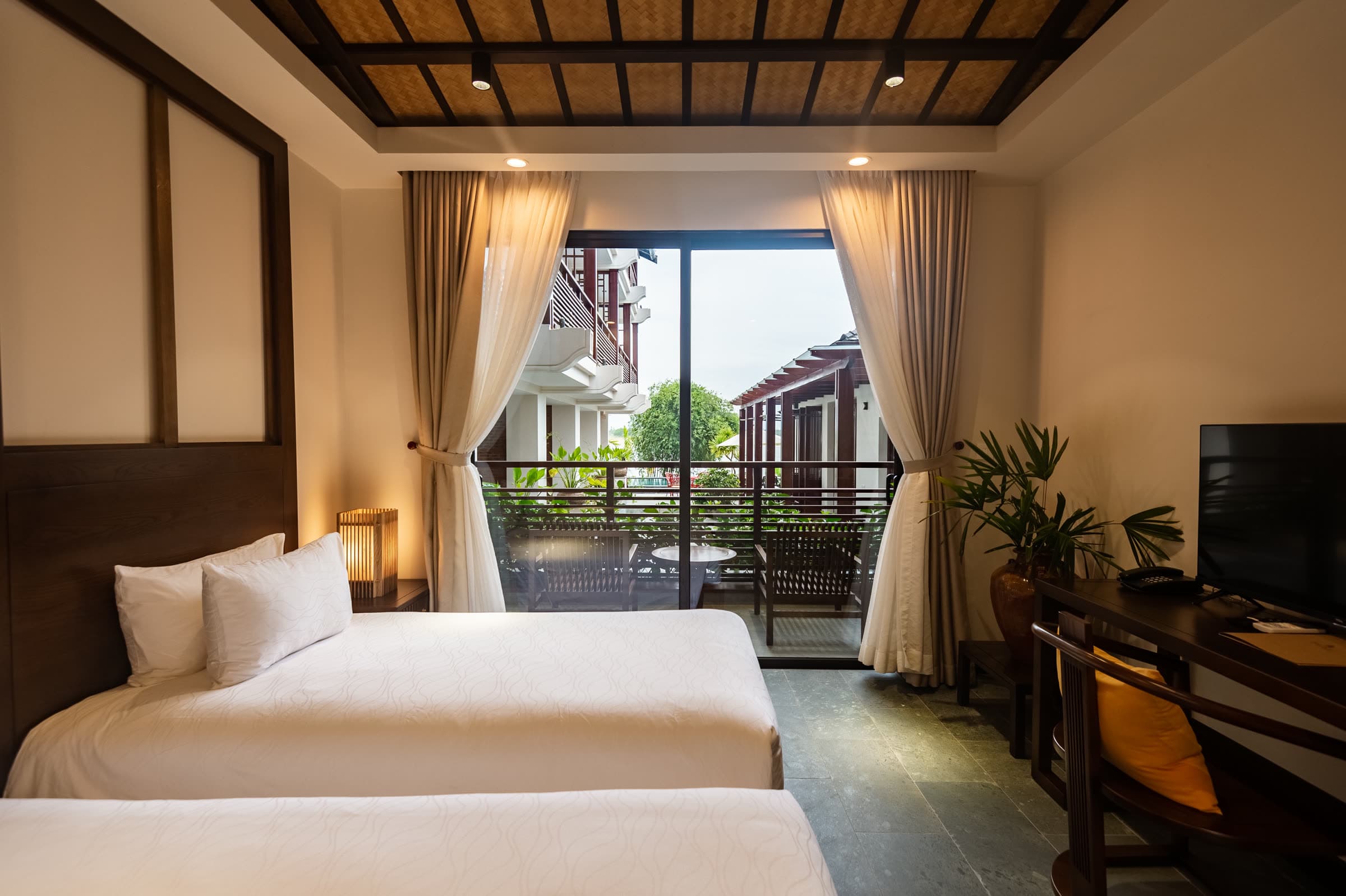 Ying and Yang twin room looking out to its private balcony